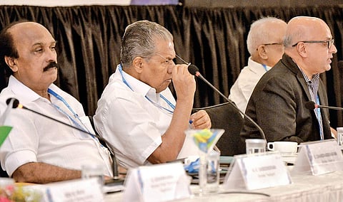Chief Minister Pinarayi Vijayan, then Revenue Minister E Chandreskharan and Chief Secretary Tom Jose at the Rebuild Kerala Conclave (File Photo | Vincent Pulickal, EPS)