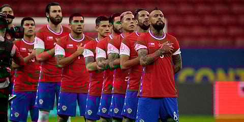Chile's team stand during the playing of the national anthem before a Copa America match against Paraguay. (Photo | AP)