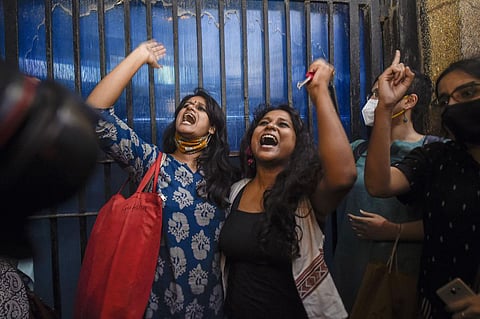 Student activists Natasha Narwal, and Devangana Kalita outside Tihar prison, after a court ordered their immediate release in the north-east Delhi riots 'conspiracy' case, in New Delhi, Thursday, June