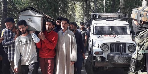 Villagers carry the coffin of daughter of a policeman who was killed along with her parents by militants at Hariparigam area, Awantipora, Pulwama, June 28, 2021. (Photo | PTI)