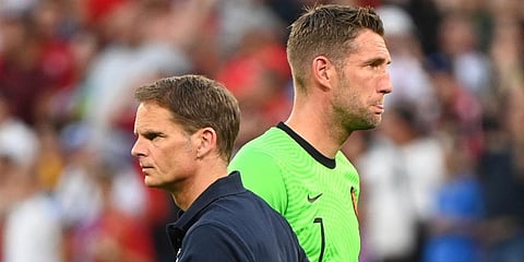 Netherlands coach Frank de Boer and goalkeeper Maarten Stekelenburg look dejected after Euro 2020 exit. (Photo | AP)