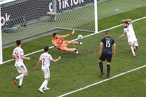 Spain's goalkeeper Unai Simon stop the ball during the Euro 2020 soccer championship round of 16 match between Croatia and Spain. (Photo | AP)