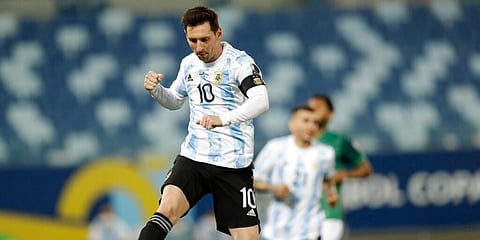 Argentina's Lionel Messi celebrates scoring his side's second goal from the penalty spot during a Copa America match against Bolivia. (Photo | AP)