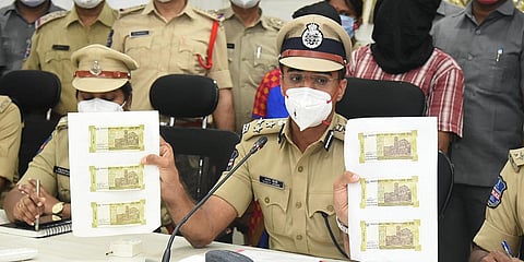 Warangal Police Commissioner Dr Tarun Joshi at a press conference. (Photo| EPS)
