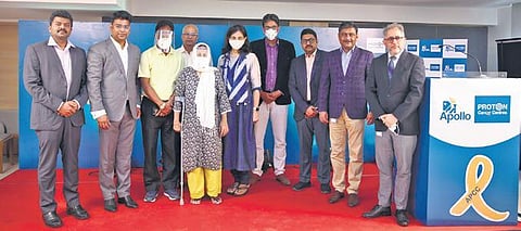 Doctors and officials of Apollo Hospitals with the patient who was treated. (Photo | Express)