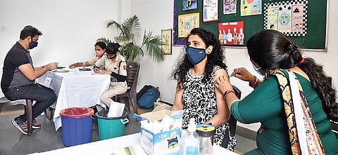 A beneficiary gets vaccine against Covid-19 in New Delhi. (Photo | Parveen Negi, EPS)