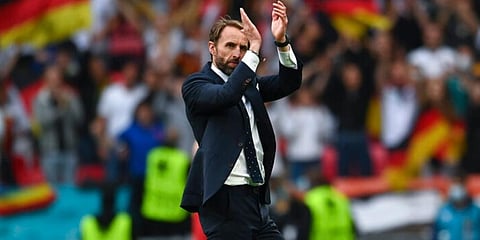 England manager Gareth Southgate applauds fans at the end of the Euro 2020 round of 16 match between England and Germany, at Wembley Stadium in London. (Photo | AP)