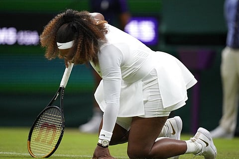 Serena Williams of the US falls to the ground during the women's singles first round match against Aliaksandra Sasnovich of Belarus on day two of the Wimbledon. (Photo | AP)