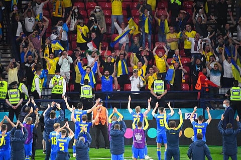 Ukraine's players celebrate victory after the Euro 2020 soccer championship round of 16 match between Sweden and Ukraine at Hampden Park stadium in Glasgow. (Photo | AP)