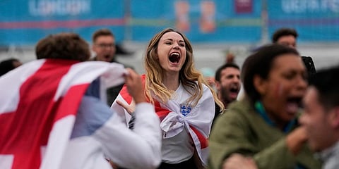 English fans celebrate their team's second goal as they watch the Euro 2020 round of 16 match between England and Germany. (Photo | AP)