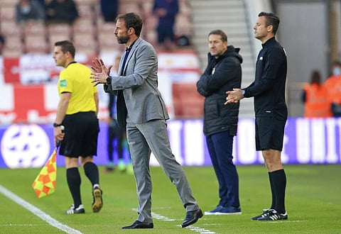 England coach Gareth Southgate gestures as he stands on the touchline during the international friendly soccer match between England and Austria. (Photo | AP)