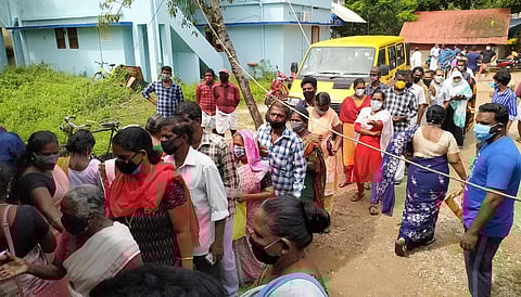 People waiting in queue to obtain Covid vaccination token at a health centre at Puthukurichy in Thiruvananthapuram. (Photo | BP Deepu, EPS)