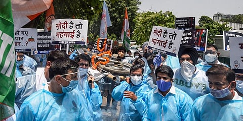 Indian Youth Congress activists protest against the price hike of Petrol and Diesel in New Delhi (Photo | PTI)