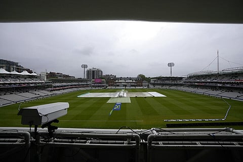 Rain covers protect the pitch, as rain delays the start of play on the third day of the Test match between England and New Zealand at Lord's cricket ground in London. (Photo | AP)