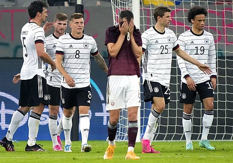 Latvia's Eduards Emsis, front, reacts during the international friendly soccer match between Germany and Latvia in Duesseldorf. (Photo | AP)