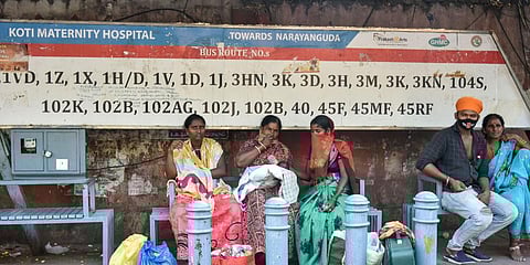 Patients who were discharged from Koti Maternity Hospital wait for transport to reach home. (File Photo | Vinay Madapu, EPS)