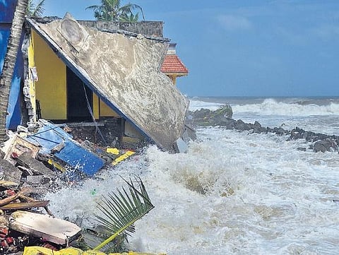 Houses battered by sea erosion near Valiyathura | file pic