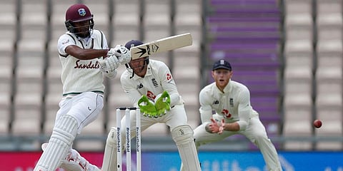 West Indies' Kraigg Brathwaite, left, plays a shot during the third day of the first cricket Test match between England and West Indies, at the Ageas Bowl in Southampton. (Photo | AP)