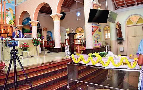 A funeral mass in Mangaluru being live-steamed | Express
