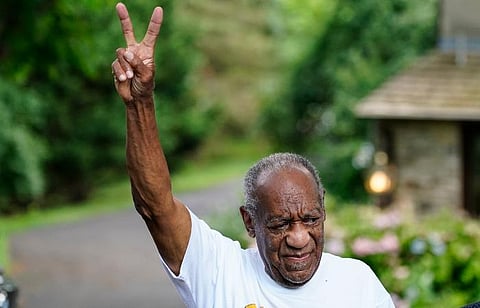 Cosby flashed the V-for-victory sign as he trudged into his suburban Philadelphia home after serving nearly three years of a 3-to 10-year sentence (Photo | AP)