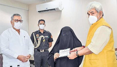 J&K Lt. Governor Manoj Sinha launches SASCM, a social protection scheme for Covid-affected families, in Srinagar on Wednesday | Pti