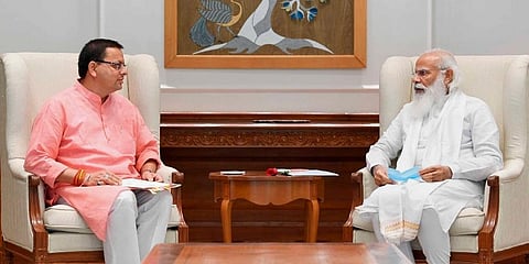 Uttarakhand CM Pushkar Singh Dhami meets Prime Minister Narendra Modi in New Delhi, Saturday, July 10, 2021. (Photo | PTI)