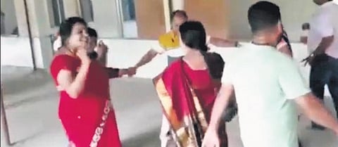 Video grab of Kudmulgumma BEO breaching safety rules and dancing in a group