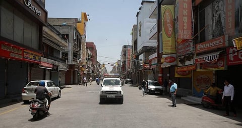 A view of the deserted Laxmi Nagar main market after it was ordered closed till July 5 for violation of Covid-19 norms on Wednesday. (Photo | Shekhar Yadav/EPS)