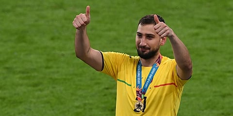 Italy goalkeeper Gianluigi Donnarumma celebrates after winning the Euro 2020 final soccer match between Italy and England at Wembley Stadium. (Photo | AP)