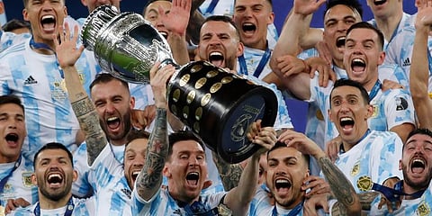 Argentina captain Lionel Messi celebrates with the trophy after beating Brazil 1-0 in the Copa America final soccer match at Maracana Stadium in Rio de Janeiro. (Photo | AP)
