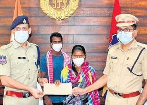 SP Sunil Dutt with a maoist couple that surrendered fearing Covid. (File Photo | Express)