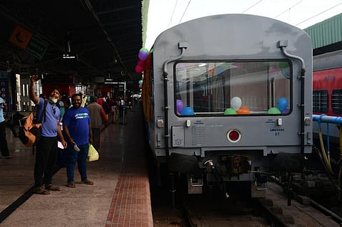 Passengers take a selfie with the Vistadome coach at Yeswantpur station in Bengaluru on Monday. (Photo | Express)