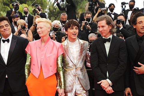 Benicio Del Toro, from left, Tilda Swinton, Timothee Chalamet, director Wes Anderson, and Adrien Brody pose upon arrival at Cannes film festival, France, July 12, 2021. (Photo | AP)