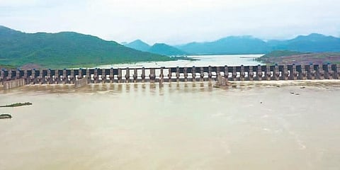 Floodwater flows through spillway gates at Polavaram on Monday, July 12, 2021. (Photo | Express)