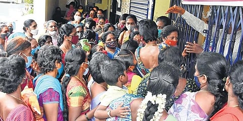 Women jostle at a bank to apply for loans on Monday, July 12, 2021, in Tirupati. (Photo | Express, Madhav K)