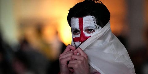 An England supporter reacts in the designated fan zone at Trafalgar Square in London. (Photo | AP)