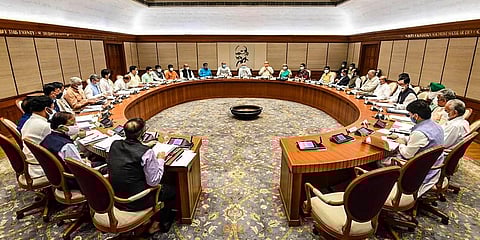 Prime Minister Narendra Modi chairs a meeting with new Union Cabinet Ministers, at his official residence in New Delhi, July 14, 2021. (Photo | PTI)