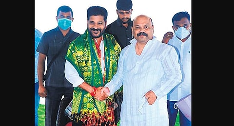 Former Nizamabad Mayor D Sanjay meets TPCC president Revanth Reddy at his residence in Hyderabad on Tuesday