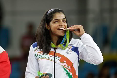 FILE | India's Sakshi Malik poses with her bronze medal at the 2016 Summer Olympics in Rio de Janeiro. (Photo | AP)
