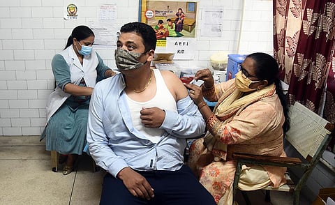 A man receives a dose of COVID-19 vaccine, at a vaccination centre in New Delhi. (Photo | Parveen Negi, EPS)