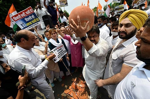 Congress supporters during a protest march towards the residence of CM Arvind Kejriwal over water crisis in New Delhi. (Photo | PTI)