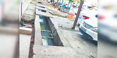 Uncovered drain at Jobra Rehman Square. (Photo| EPS)