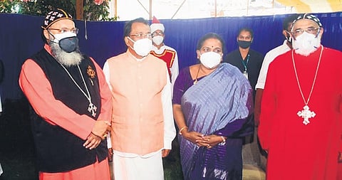 Jacobite synod secretary Bishop Thomas Mor Thimothios and Orthodox Church metropolitan Geevarghese Mar Yulios Pulikkottil with P S Sreedharan Pillai