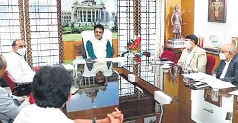 Deputy CM and Higher Education Minister Dr C N Ashwath Narayan speaks to officials in Bengalur on Friday | Express