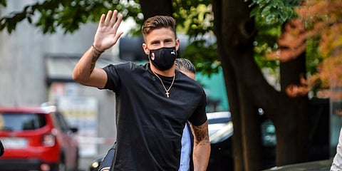 Newly hired AC Milan soccer club player Olivier Giroud arrives at a medical center in Milan. (Photo | AP)