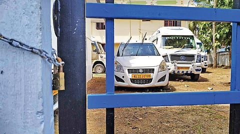 Vehicles lying idle at Adithya Tours and Travels