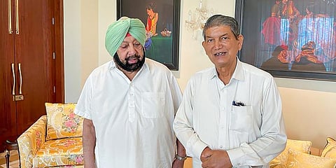 Punjab Congress General Secretary in-charge Harish Rawat meets Chief Minister Capt. Amrinder Singh. (Photo | PTI)