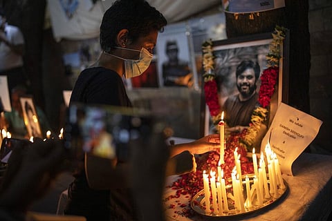 Journalists light candles and pay tribute to Reuters photographer Danish Siddiqui in New Delhi. (Photo | AP)