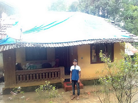 Amalraj in front of his house at Chethalayam in Wayanad. (Photo | EPS)