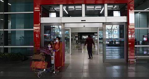 Passengers wearing protective mask to mitigate the spread of coronavirus arrive at Terminal 3 of IGI Airport in New Delhi. (File Photo | Ashish Kumar Kataria, EPS)